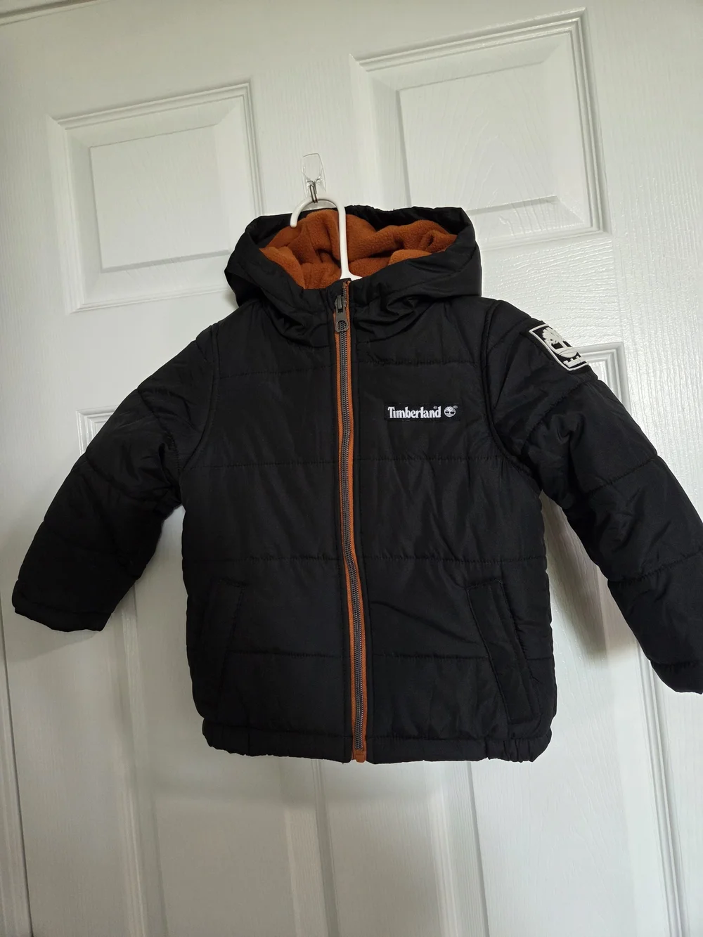 Timberland Kids' Black Puffer Jacket with Orange Lining